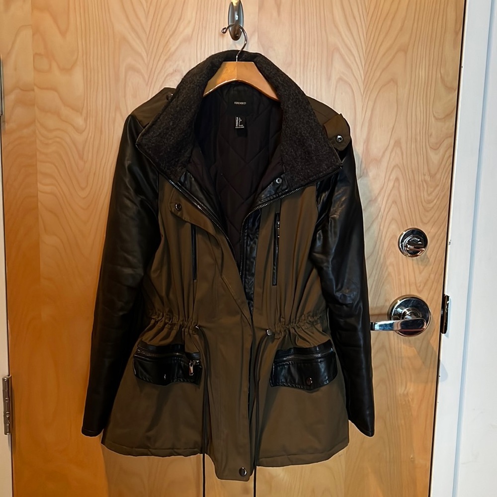 Gently used Coat in great condition no tears or stains zippers work perfectly